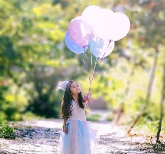 ژست عکس تولد دختر بچه در طبیعت