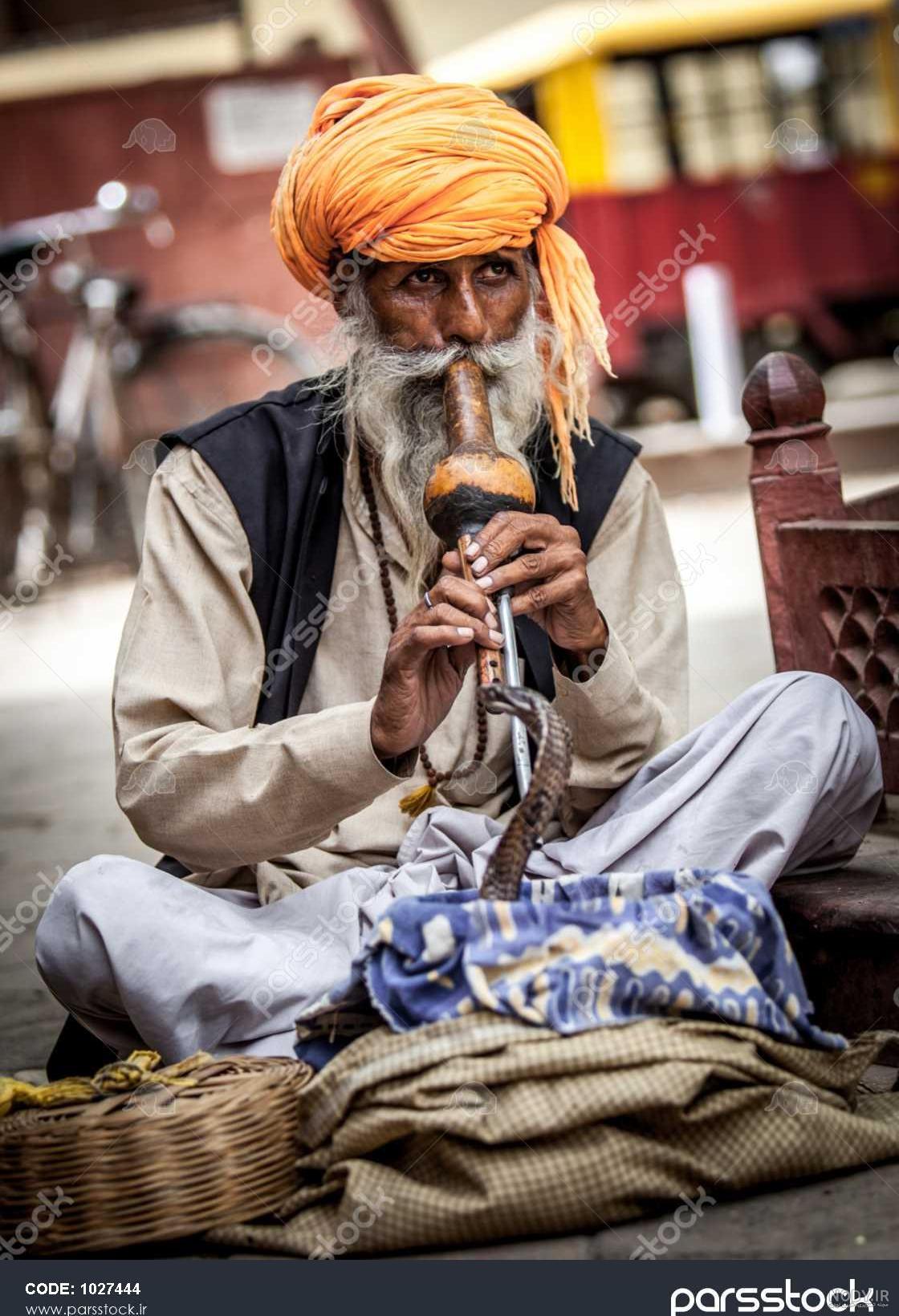 عکس مارگیر عکس مارگیر