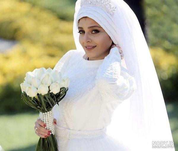 عکس لباس عروس گل برجسته عکس لباس عروس گل برجسته