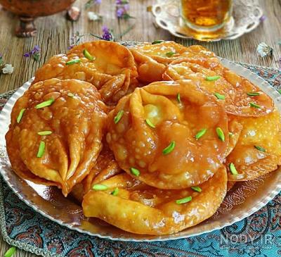 طرز تهیه گوش فیل با خمیر یوفکا طرز تهیه گوش فیل با خمیر یوفکا