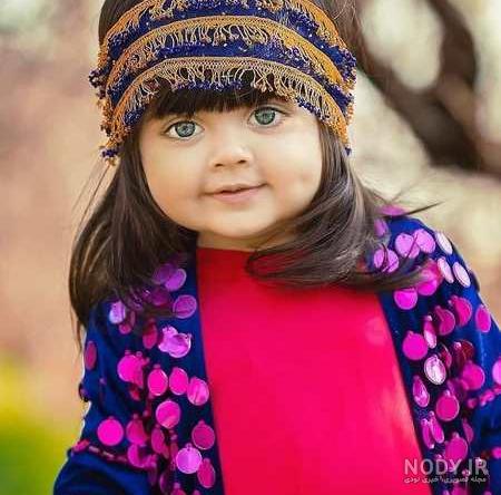 عکس دختر بچه چشم رنگی