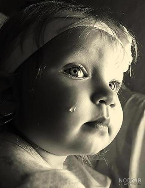 عکس دختر بچه چشم رنگی