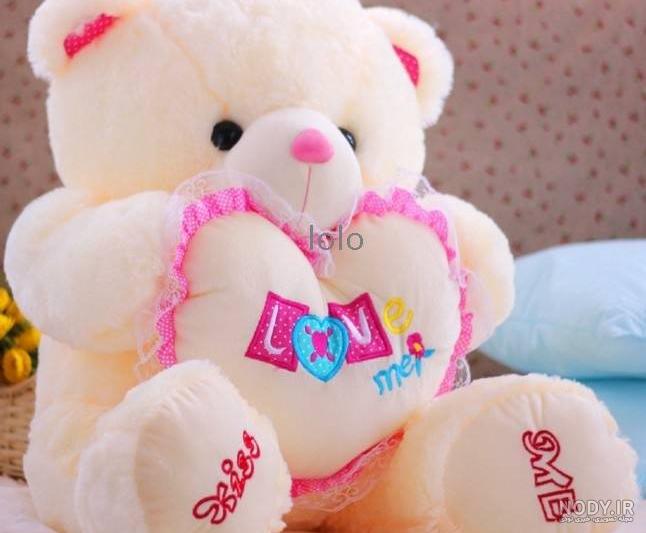عکس عروسک مو قرمز
