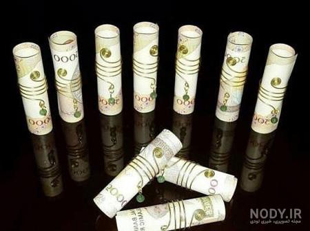 تزیین پول با گل برای کادو تزیین پول با گل برای کادو