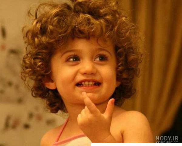 عکس دختر بچه مو فرفری مشکی