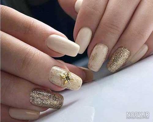 ژلیش طراحی ناخن سفید طلایی