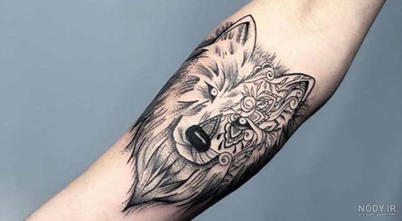 تاتو روی دست گرگ تاتو روی دست گرگ