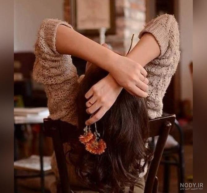 عکس دختر کنار دریا از پشت سر