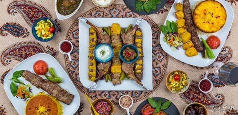 تزیین سفره مهمانی با غذاها و دسرهای رنگارنگ ایرانی