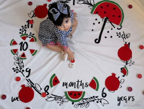 ایده‌های عکس یلدا نوزاد برای عکاسی در منزل - مجله چند ماهمه