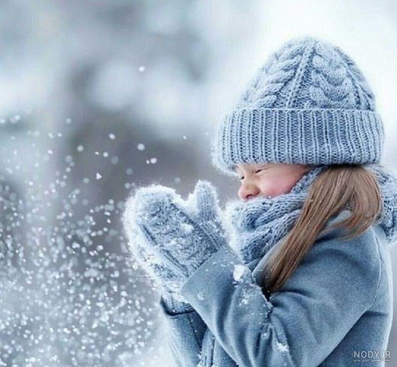 ژست عکس کودک در برف