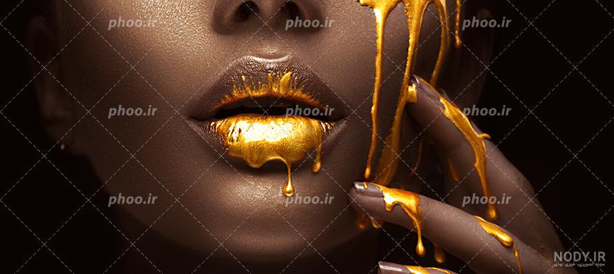 پرتره مد یک دختر سیاه پوست با طلا makeupupBeauty صورت تصویر گرفته ...