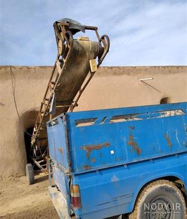 عکس نیسان آبی کمپرسی عکس نیسان آبی کمپرسی
