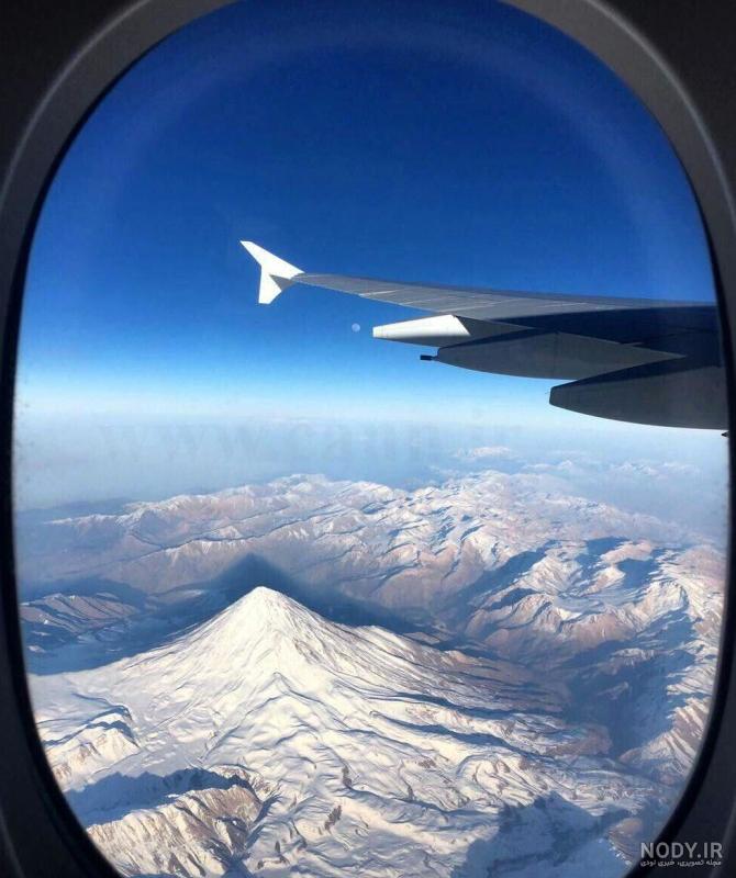 عکس پنجره هواپیما شب