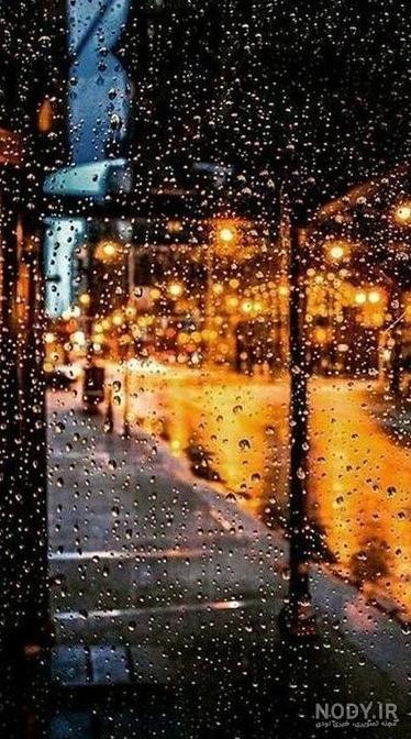 عکس باران روی شیشه ماشین در شب