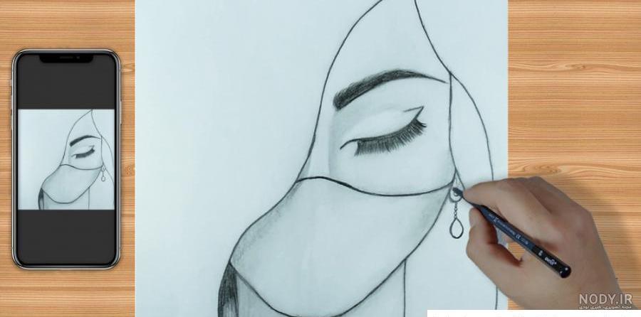 عکس دختر نقاشی با مداد