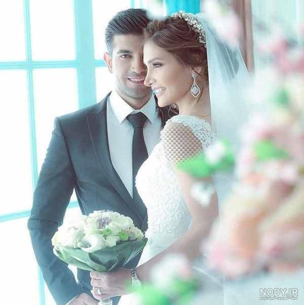 ژست عروس و داماد در آتلیه با ایده های جالب و جدید