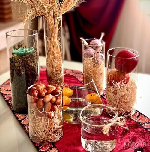 ایده تزیین سفره هفت سین با شیشه استوانه ای ساده، زیبا و لاکچری