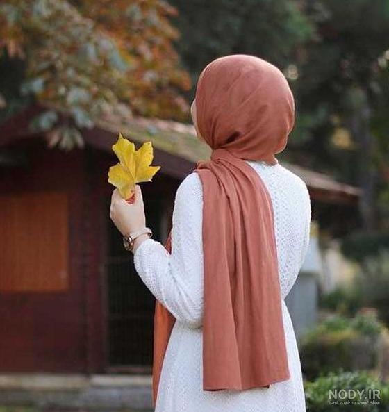 عکس پروفایل دختر با حجاب در برف - دفتر انشا