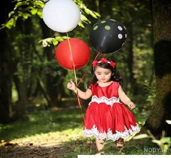 ژست عکس تولد دختر بچه در منزل