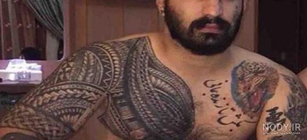 خال کوبی صورت وحید مرادی روی بدن یکی از طرف داران روحت شاد خال کوبی صورت وحید مرادی روی بدن یکی از طرف داران روحت شاد