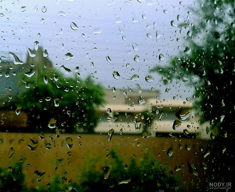 عکس باران از پشت پنجره