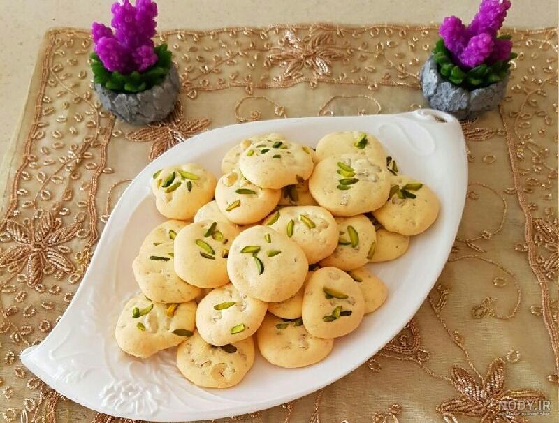طرز تهیه شیرینی گردویی پفکی و خوشمزه به روش بازاری طرز تهیه شیرینی گردویی پفکی و خوشمزه به روش بازاری