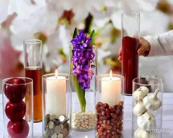 ایده تزیین سفره هفت سین با شیشه استوانه ای ساده، زیبا و لاکچری