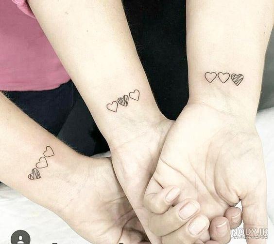 عکس تاتو دخترانه پشت کمر عکس تاتو دخترانه پشت کمر