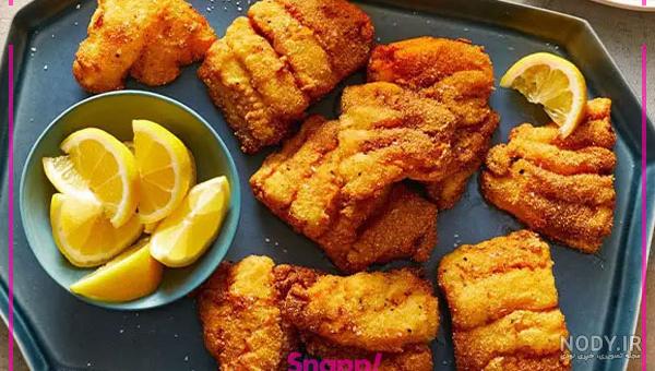 فرارو | طرز تهیه مرغ سوخاری پولکی؛ فیله استریپس فرارو | طرز تهیه مرغ سوخاری پولکی؛ فیله استریپس