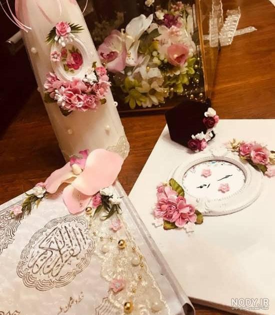 عکس با کیفیت نمایی از قرآن باز و نورانی شدن برگه های قرآن – عکس با ...