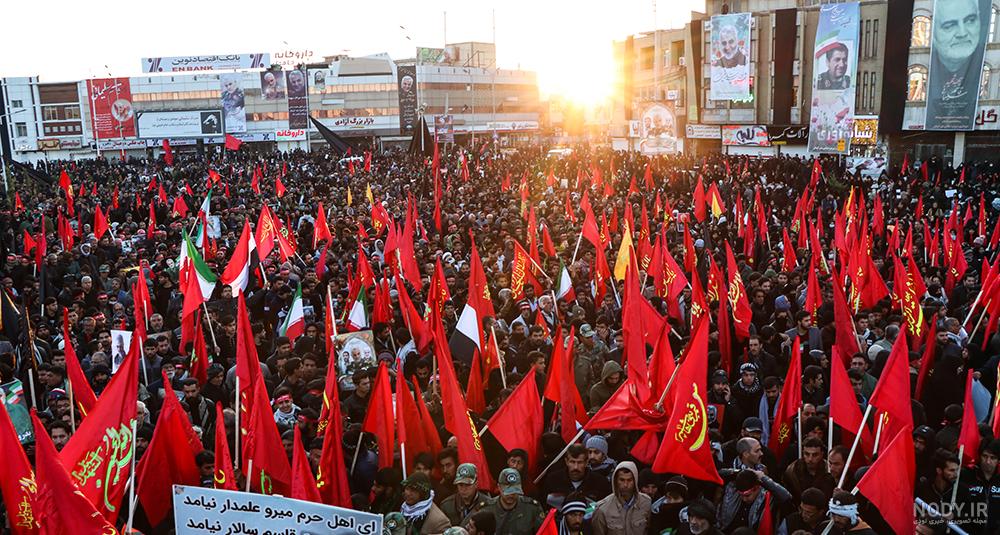عکس حاج قاسم کنار پرچم ایران - عکس نودی