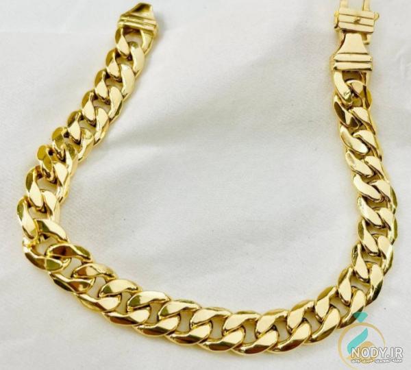 عکس دستبند مردانه چرم و طلا
