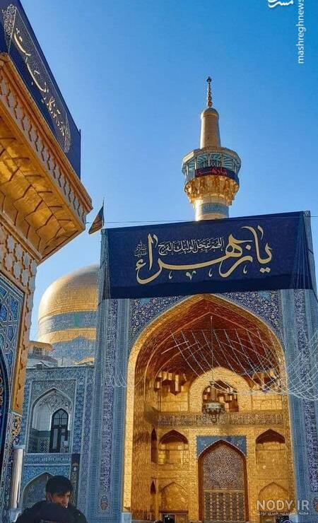 خبرآنلاین - تعویض پرچم گنبد حرم امام رضا (ع) - صاحب‌خبر