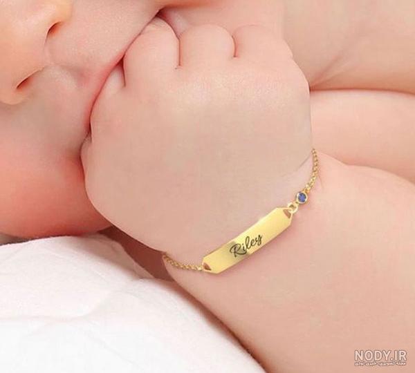 عکس دستبند پسرانه نوزادی عکس دستبند پسرانه نوزادی