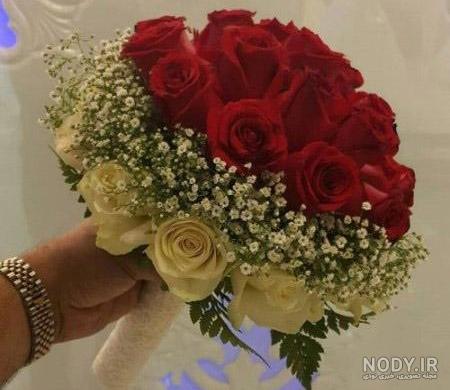 عکس های دسته گل عروس رز قرمز با تزیینات زیبا و جدید عکس های دسته گل عروس رز قرمز با تزیینات زیبا و جدید
