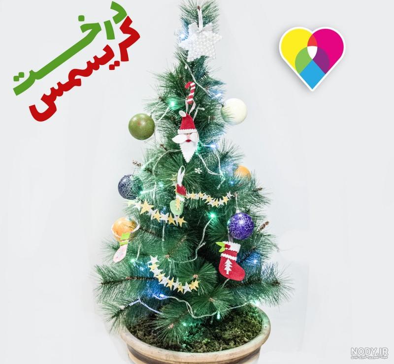 عکس زمینه دکوراسیون درخت کریسمس و هدایا پس زمینه | والپیپر گرام عکس زمینه دکوراسیون درخت کریسمس و هدایا پس زمینه | والپیپر گرام