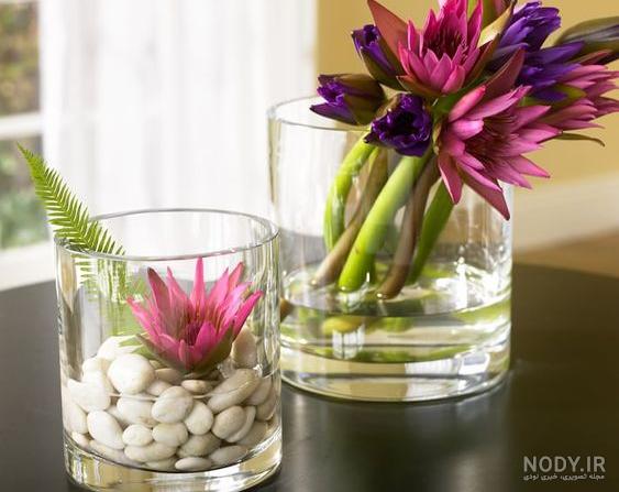 عکس تزیین یک شاخه گل رز طبیعی با کنف و پول برای هدیه