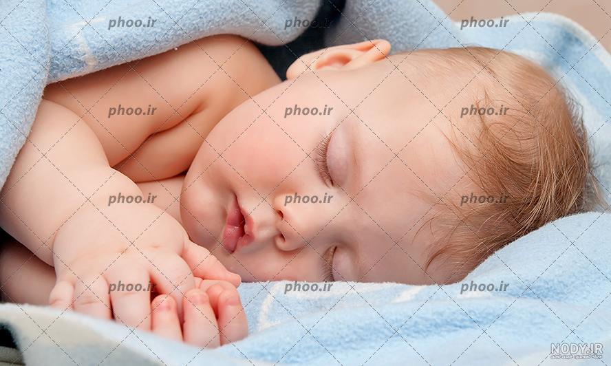عکس کودک خوابیده در گهواره عکس کودک خوابیده در گهواره