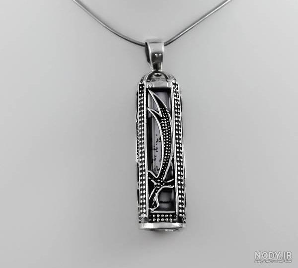 خرید و قیمت حرز امام جواد(ع) روی پوست آهو به همراه گردنبند چرم و جا حرزی  نقره (کد 3)