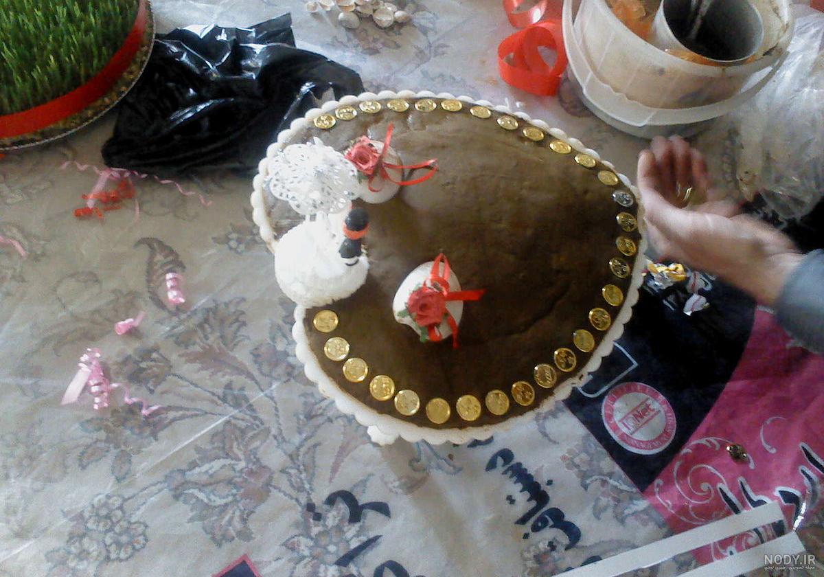 دست های زن با مهندی مشکی دستان دختر عروس هندی با حنای مشکی دست با مانیکور  فیروزه ای عالی و جواهرات ملی هند روش هند 1293512