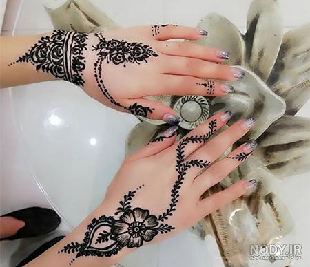 مهدی کاربرد حنا به عنوان تزیین پوست در عروسی هندی 1058716 مهدی کاربرد حنا به عنوان تزیین پوست در عروسی هندی 1058716