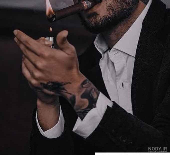 عکس پسر غمگین با سیگار