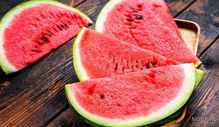 تصویر با کیفیت هندوانه و سه تا اسلایس تصویر با کیفیت هندوانه و سه تا اسلایس