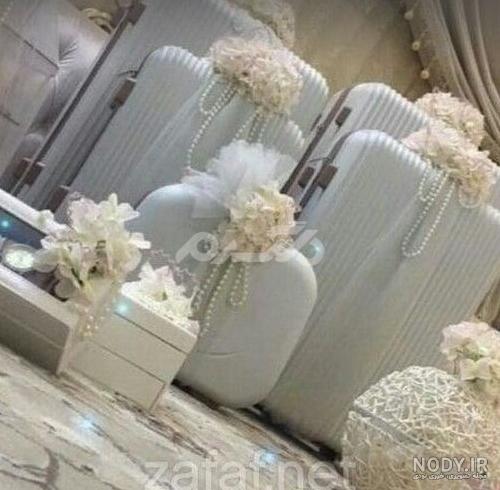 تزیین چمدان عروس و داماد + نمونه عکس