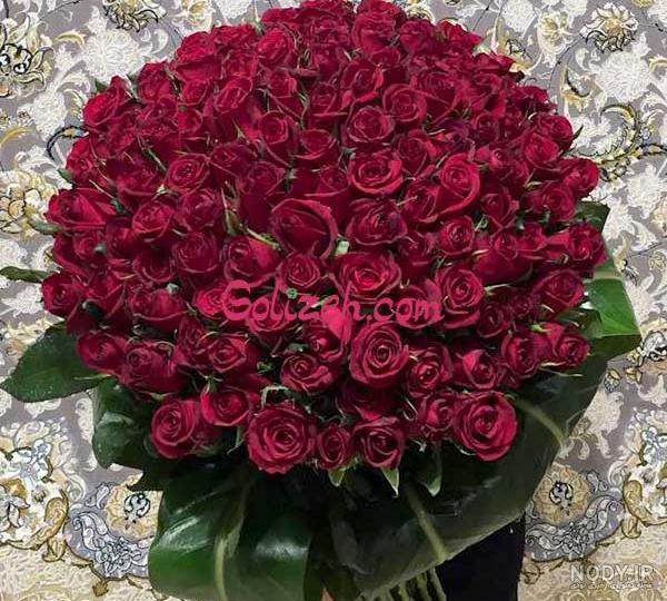 خرید و قیمت دسته گل طبیعی رز مدل 2 شاخه با تزیین کاغذی | ترب