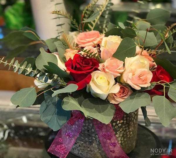 عکس گلدان پر از گل های زیبا