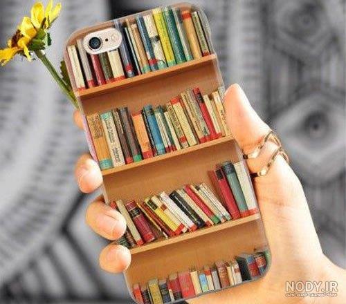 عکس با کیفیت قفسه زیبا به همراه کتاب های چیده شده - نمایشگاه هنر ایران عکس با کیفیت قفسه زیبا به همراه کتاب های چیده شده - نمایشگاه هنر ایران