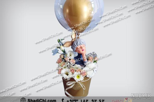 ایده های عکس آتلیه نوزاد دختر با گل آرایی - انواع مدل های عکاسی اتلیه