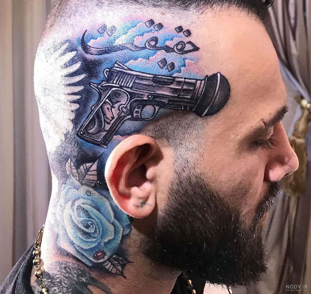 عکس امیر تتلو در حال خالکوبی